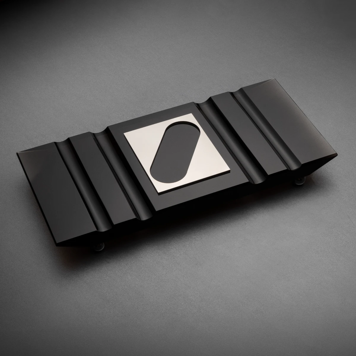 Board No. I — Jet Black obsidian cigar board, four rest channels and cutter aperture
