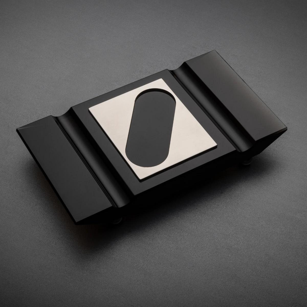 Board No. III — compact obsidian cigar board, two rest channels