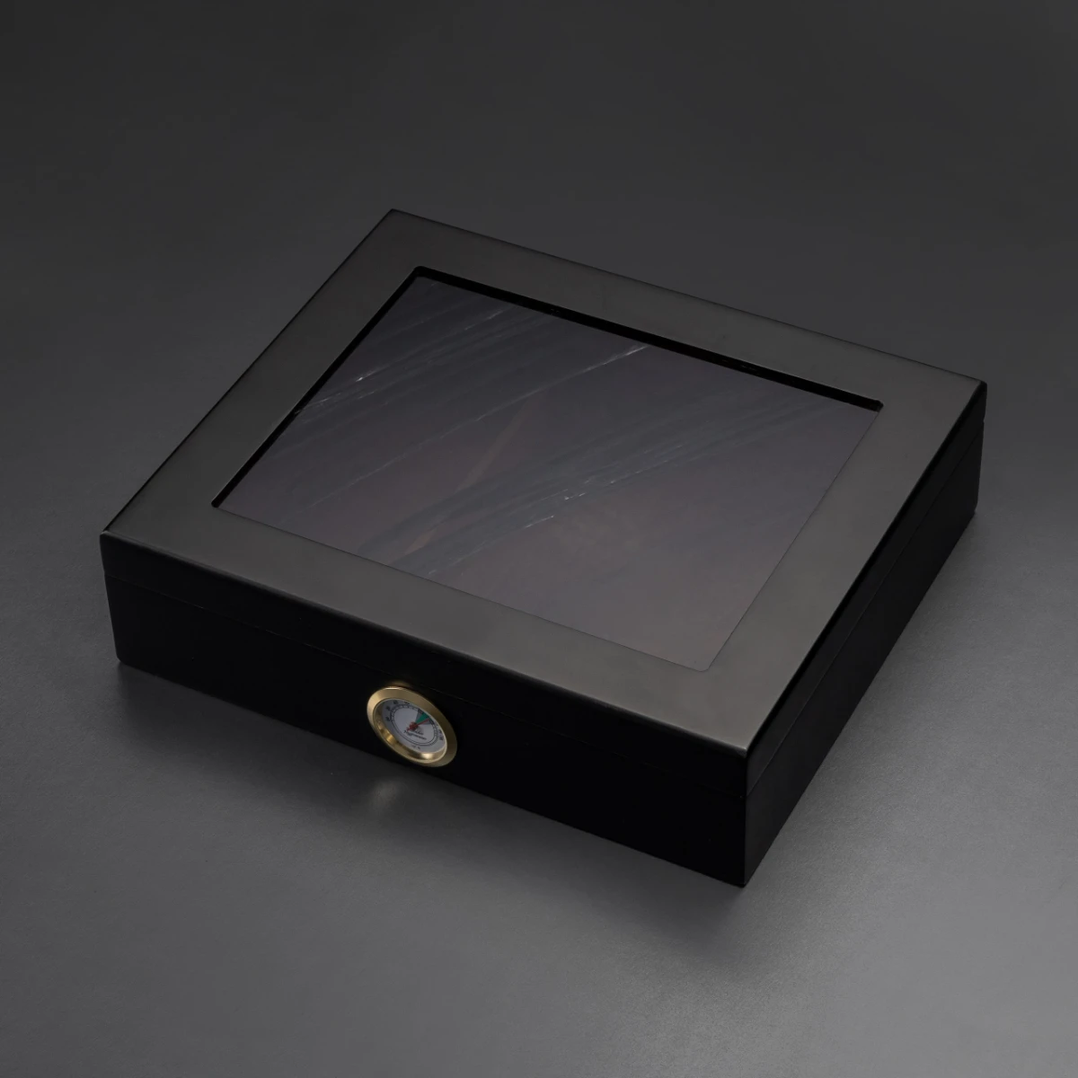 Humidor No. I — semi-translucent obsidian lid on Spanish cedar humidor