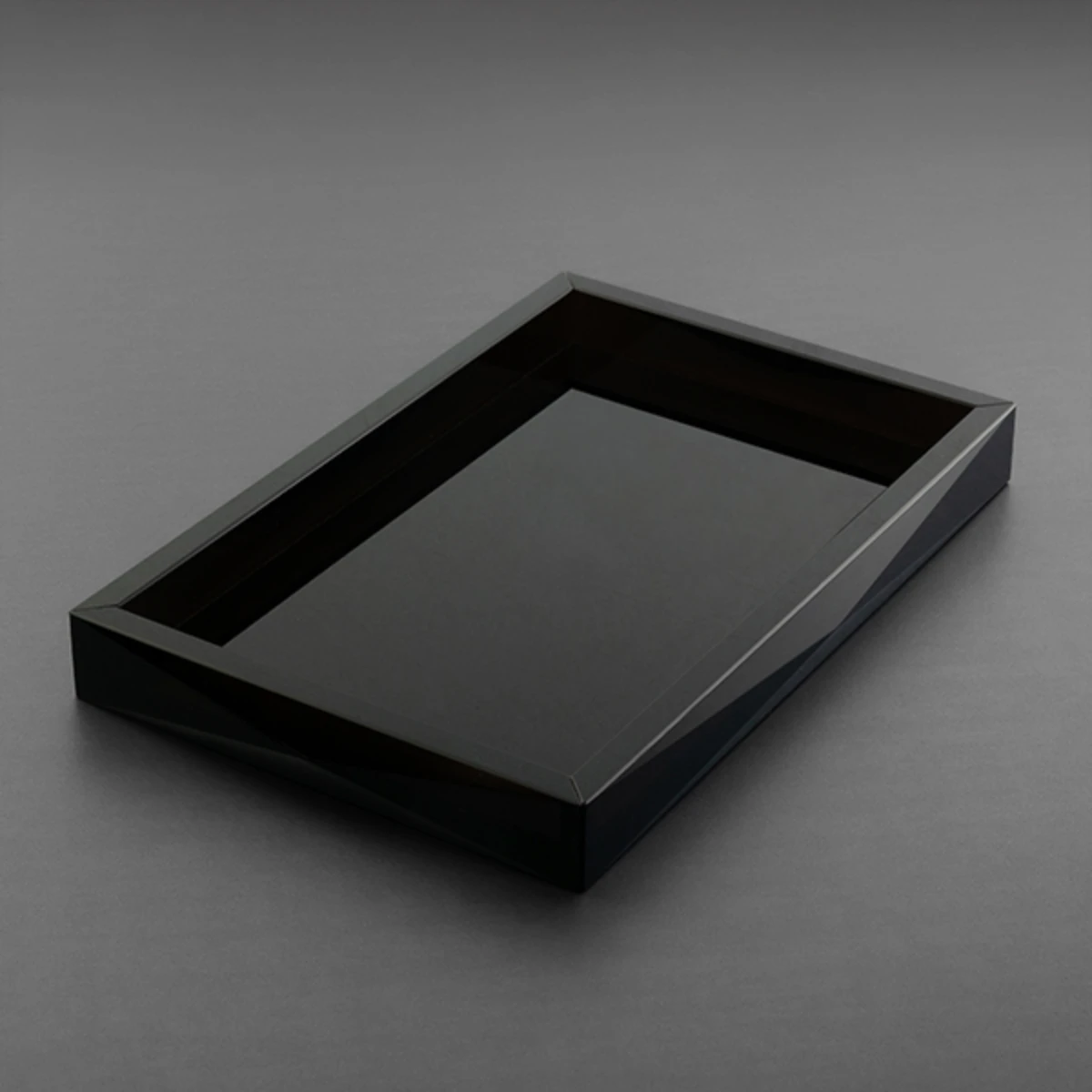 Obsidian towel and paper tray — bespoke volcanic stone bathroom accessory